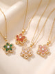 Flower pendant necklaces in pink, red, green and clear