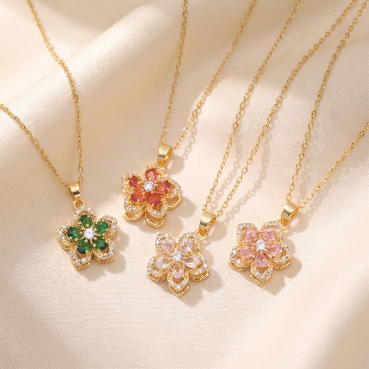 Flower pendant necklaces in pink, red, green and clear