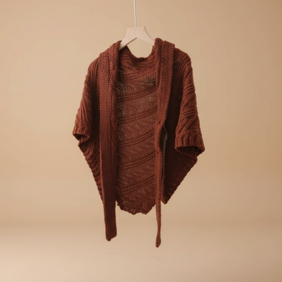 Brown textured dress with matching cardigan on a beige background