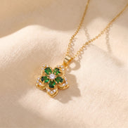 Flower pendant necklace with green stones