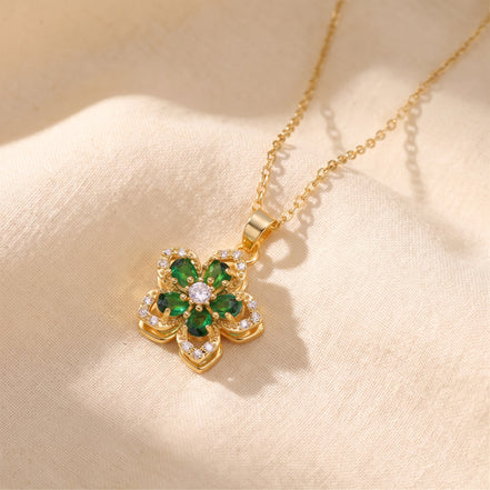 Flower pendant necklace with green stones