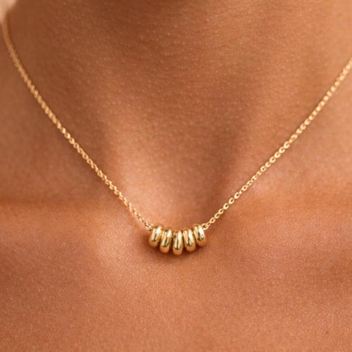 Gold mini rings sliding necklace on tanned skin, dainty gold beaded chain necklace, minimalist gold necklace for women, delicate everyday gold necklace, layering necklace gift for her