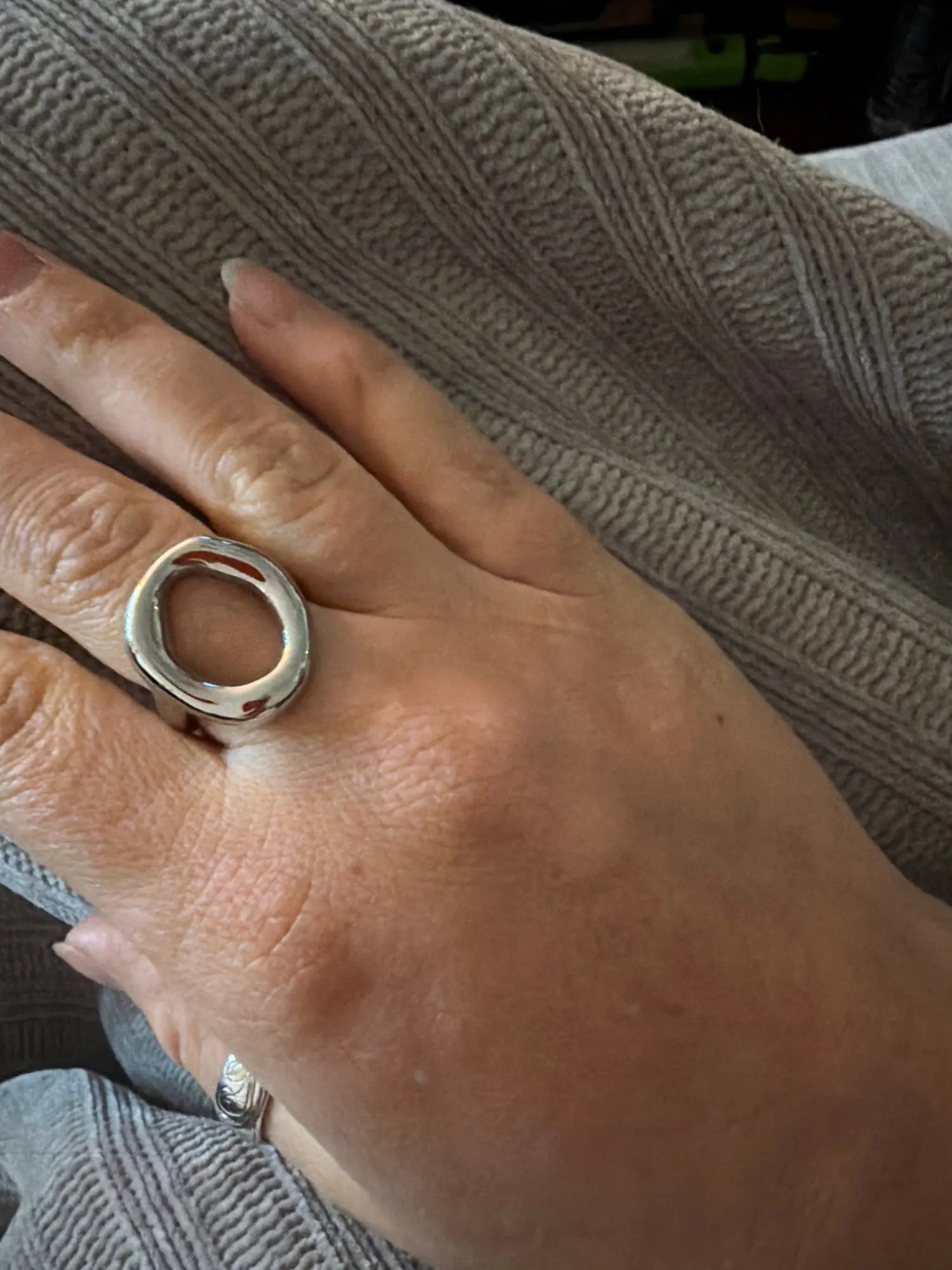 Customer wearing the silver abstract oval ring
