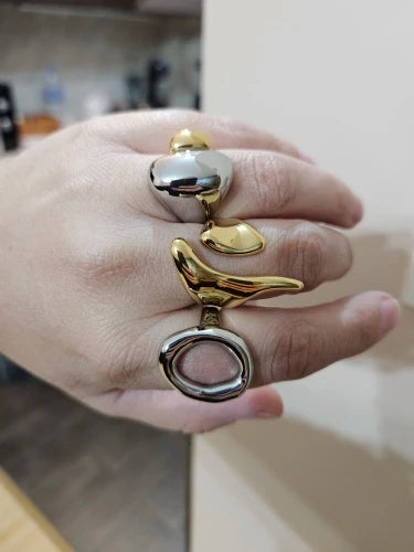 Customer styling the silver abstract oval ring with other rings