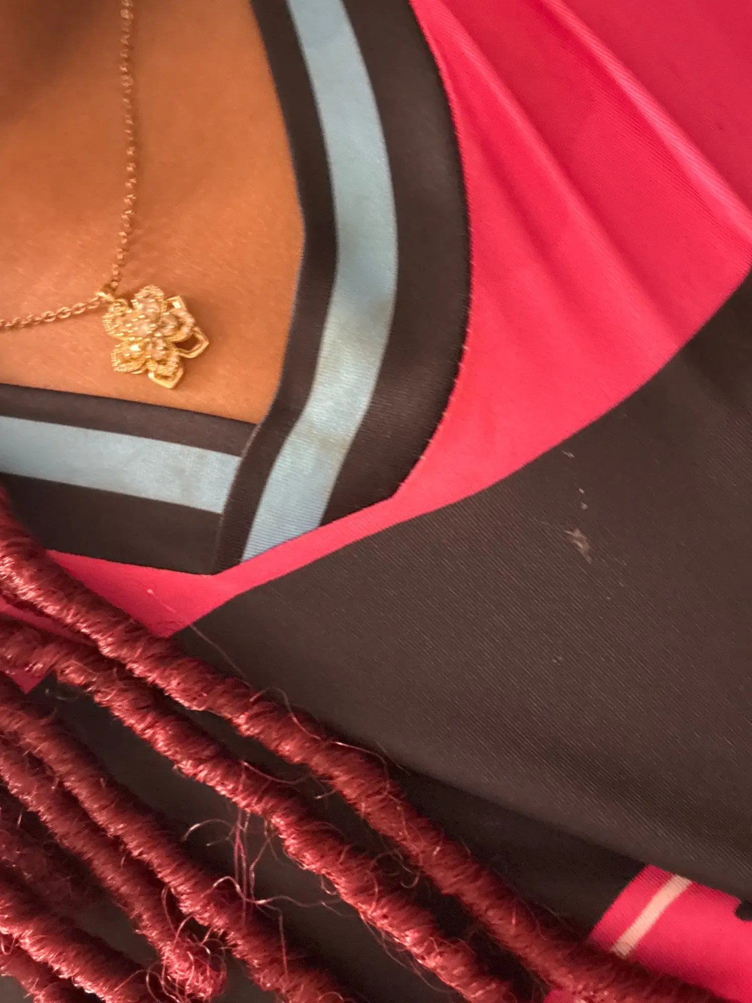 Clear rotating flower pendant photographed by a customer